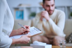 Man struggling with withdrawal symptoms