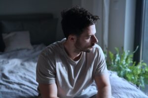 Adult male dealing with withdrawal symptoms